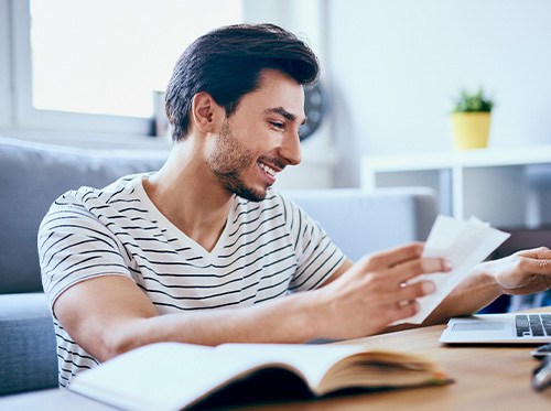 Delray Beach patient budgeting for Invisalign