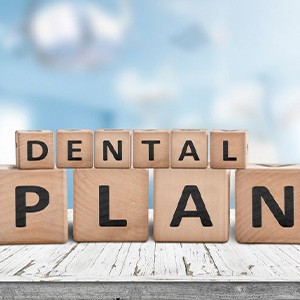 Blocks spell “dental plan”