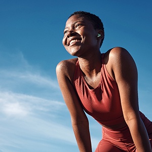 Lady smiles outdoors